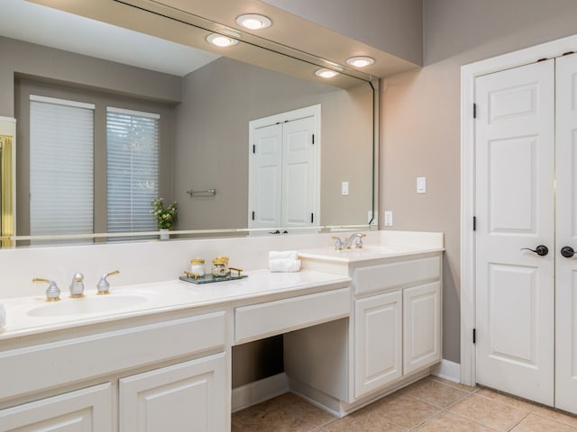 13312 Country Lake Dr, Austin, TX 78732 - full bath with double vanity and tile patterned floors