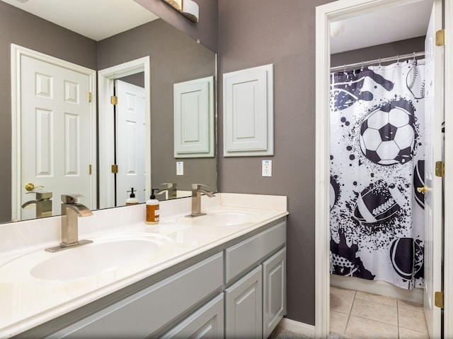 13312 Country Lake Dr, Austin, TX 78732 - bathroom featuring double vanity, tile patterned floors, and curtained shower