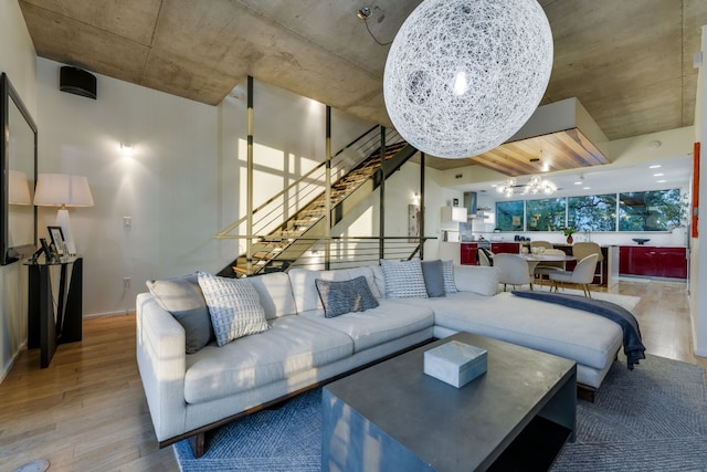 living room with a chandelier and hardwood / wood-style floors