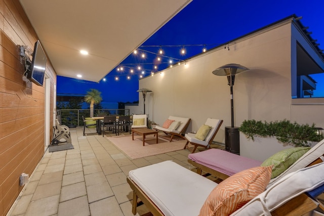 patio at night with outdoor lounge area