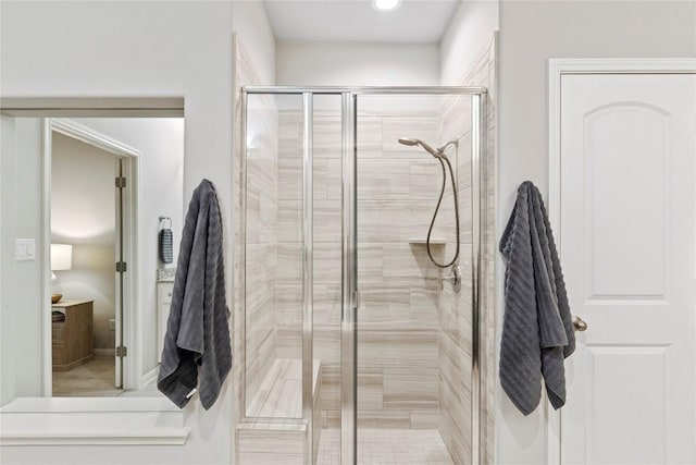 bathroom featuring walk in shower