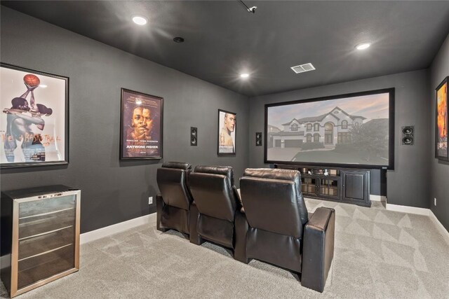 cinema featuring light carpet and wine cooler