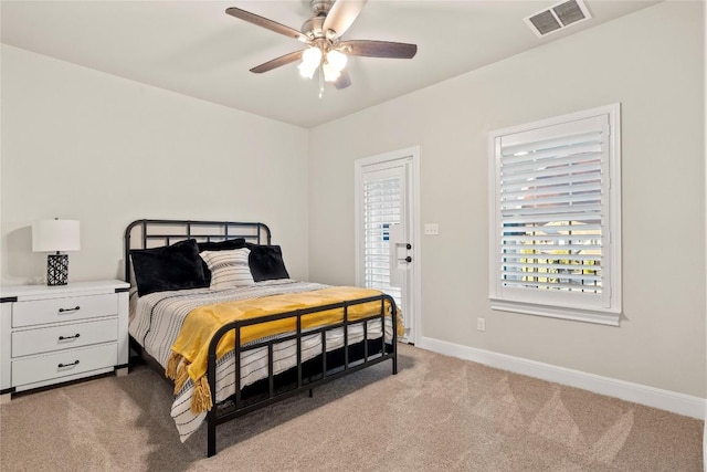 bedroom featuring ceiling fan and carpet flooring