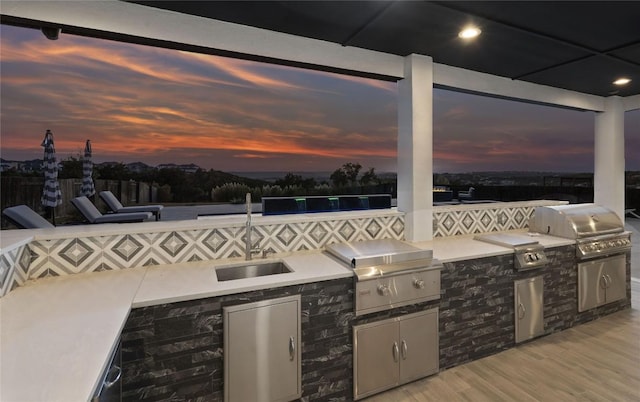 2513 Long Lasso Pass, Leander, TX 78641 - view of patio / terrace with area for grilling and a sink