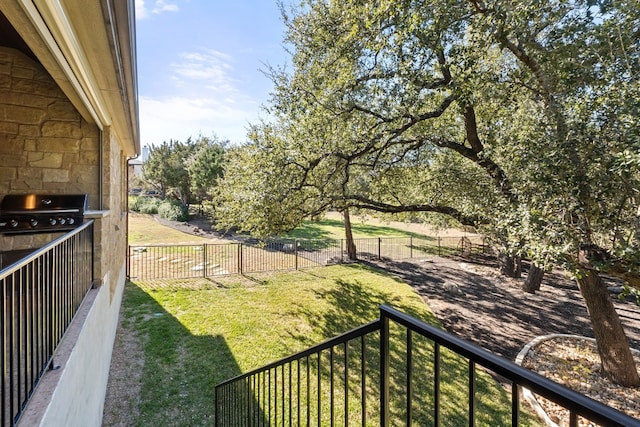 view of yard featuring an outdoor kitchen