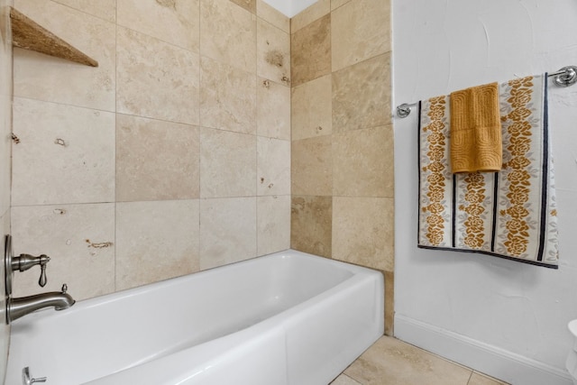 2108 Glendale Pl, Austin, TX 78704 - bathroom featuring a tub, baseboards, and tile patterned flooring
