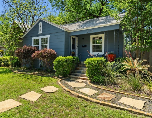2108 Glendale Pl, Austin, TX 78704 - view of front of house featuring a shingled roof and a front yard