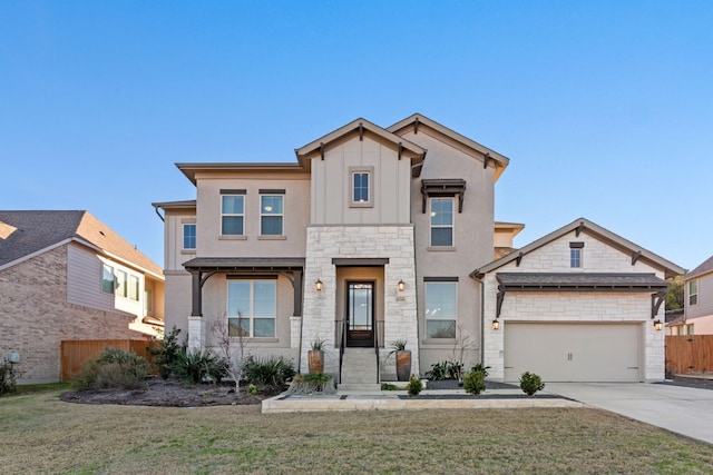 view of front of house with a garage and a front yard