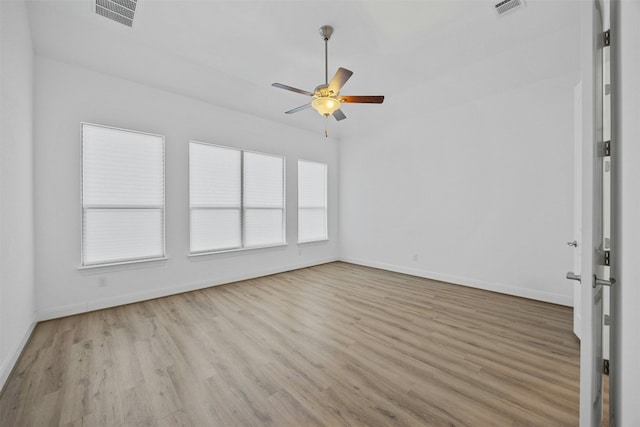 unfurnished room with ceiling fan and light hardwood / wood-style flooring