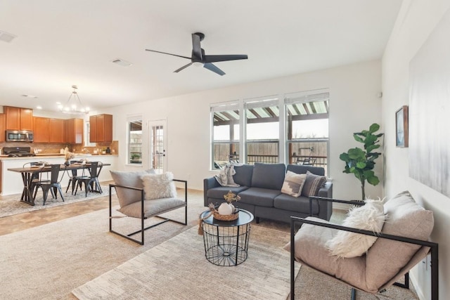 living room featuring ceiling fan