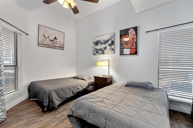 bedroom featuring ceiling fan and wood-type flooring