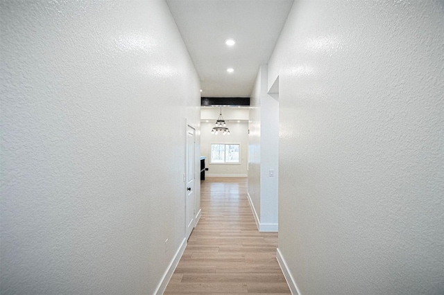 hallway featuring light hardwood / wood-style floors