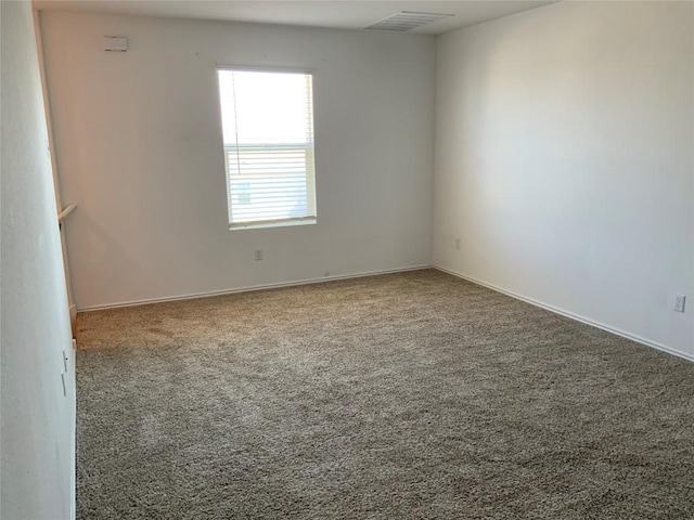 empty room with carpet floors