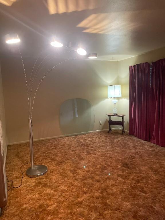 basement with carpet flooring