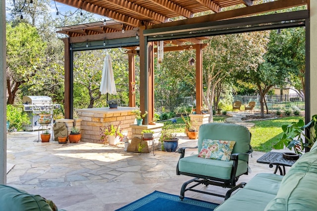 view of patio / terrace with an outdoor hangout area and a pergola