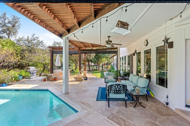 view of swimming pool featuring an outdoor hangout area, ceiling fan, and a patio area