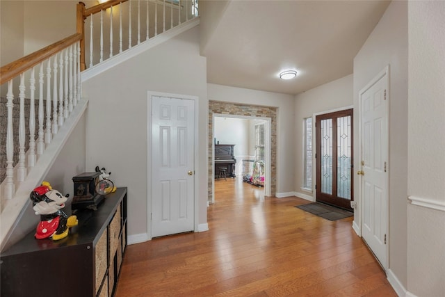 16805 Willow Oak Ln, Round Rock, TX 78681 - entrance foyer featuring light wood-style floors, stairs, and baseboards