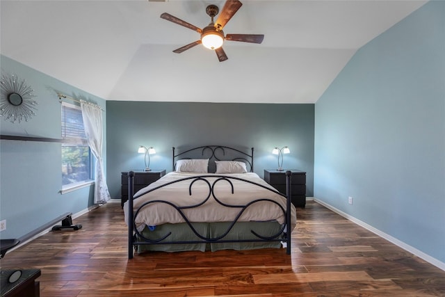 bedroom featuring vaulted ceiling, dark wood-type flooring, and ceiling fan