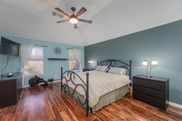 bedroom featuring dark wood-type flooring, ceiling fan, and vaulted ceiling