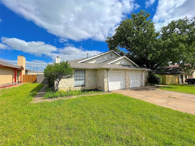 view of front of house with a garage and a front yard