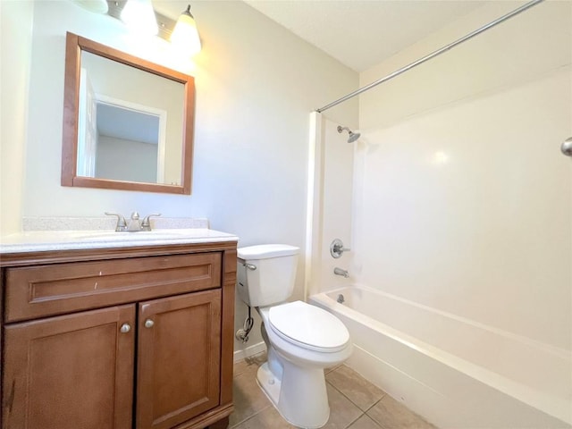 full bathroom featuring tile patterned flooring, bathing tub / shower combination, vanity, and toilet