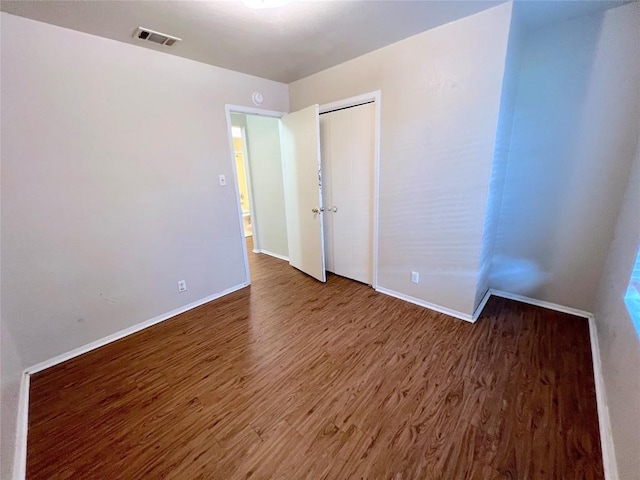 interior space with dark hardwood / wood-style flooring