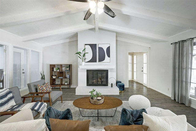 living room with dark hardwood / wood-style flooring, vaulted ceiling with beams, and ceiling fan