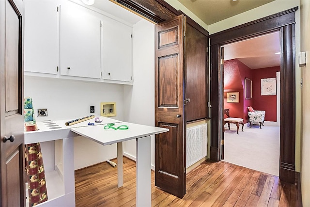 home office featuring light hardwood / wood-style floors