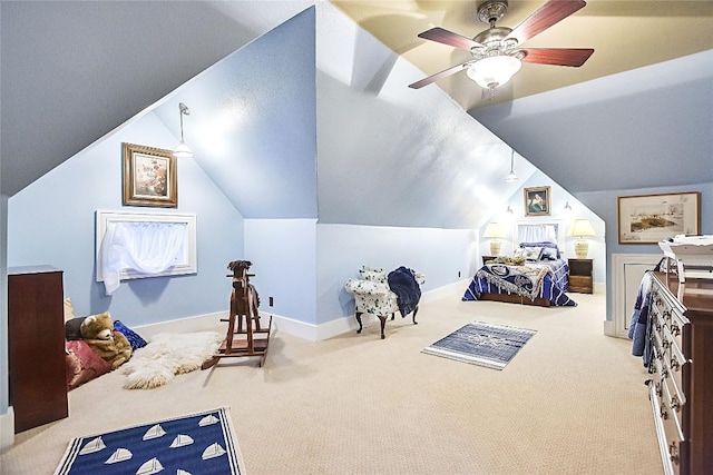 carpeted bedroom with lofted ceiling, a textured ceiling, and ceiling fan