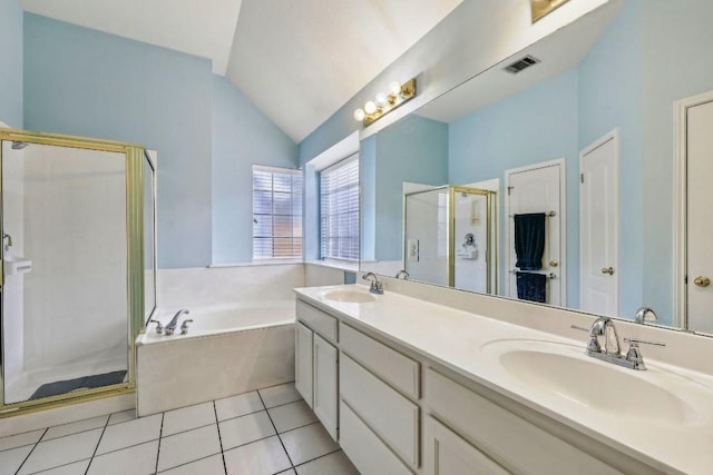 bathroom with vaulted ceiling, vanity, independent shower and bath, and tile patterned flooring