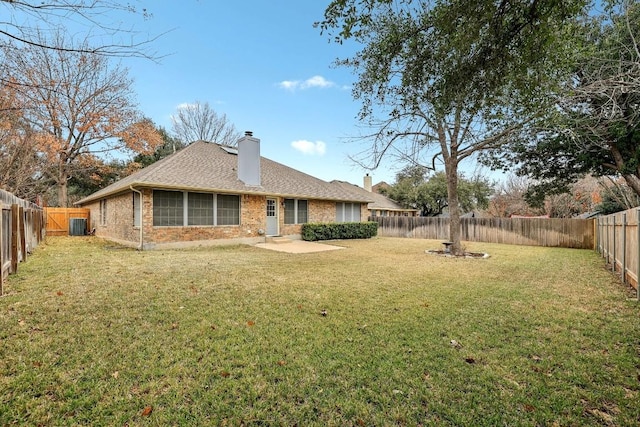 back of property with cooling unit, a lawn, and a patio