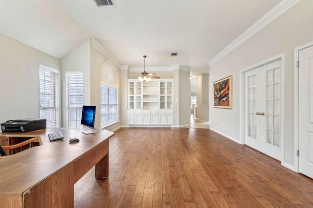 home office with ceiling fan, ornamental molding, wood-type flooring, and french doors