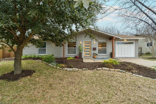 ranch-style house with a garage and a front yard