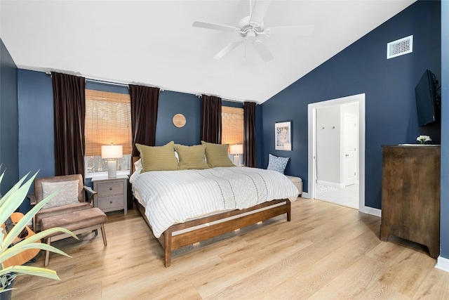 bedroom featuring ceiling fan, vaulted ceiling, and light hardwood / wood-style flooring