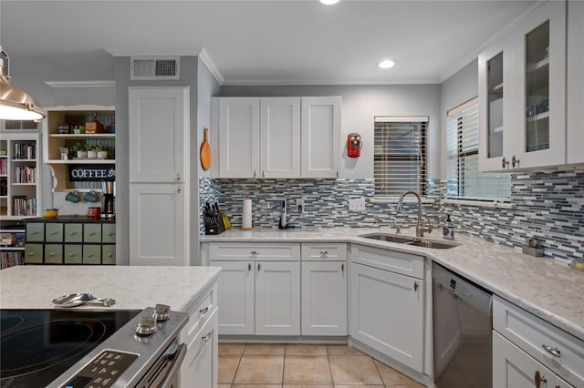 kitchen with sink, white cabinetry, light tile patterned floors, ornamental molding, and stainless steel appliances