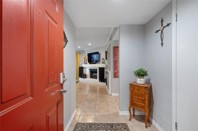 foyer entrance featuring light tile patterned flooring