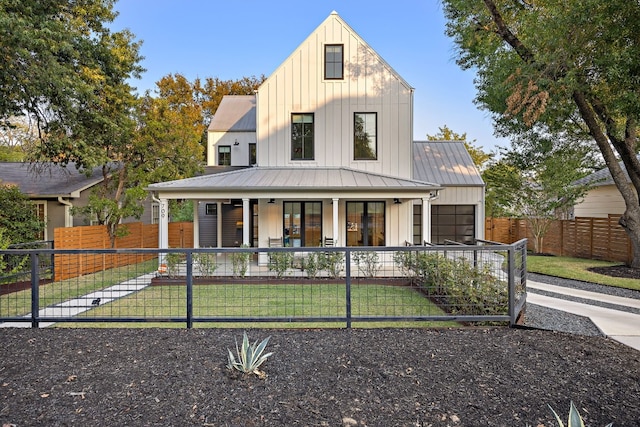 modern inspired farmhouse with a porch