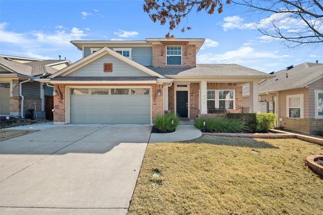 view of front of home with a garage and a front lawn