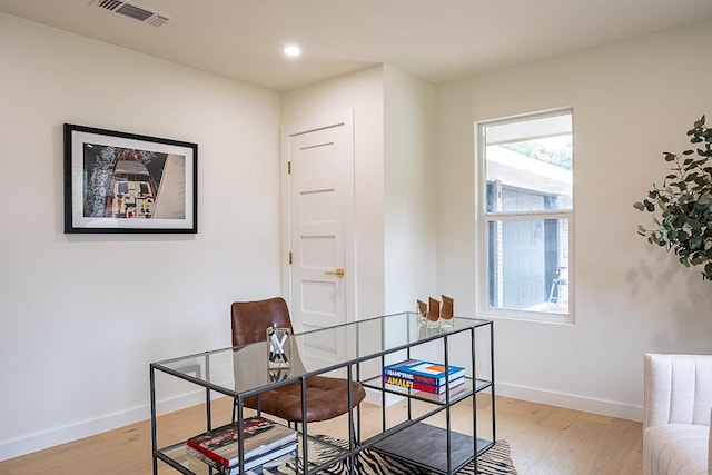 office space featuring light wood-type flooring