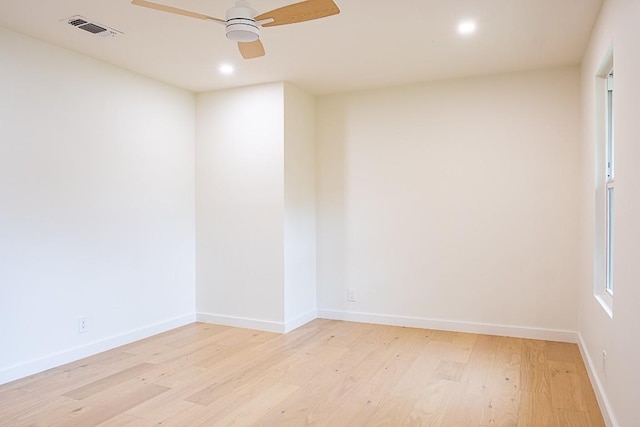 unfurnished room with ceiling fan and light hardwood / wood-style flooring