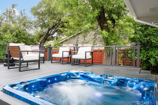 view of swimming pool featuring a deck