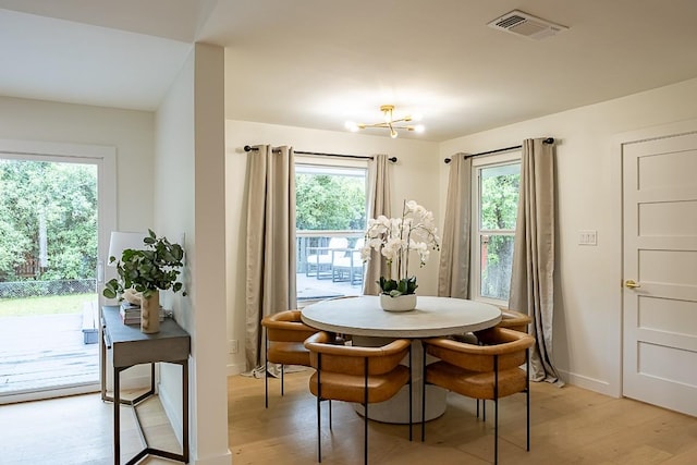 dining room featuring light wood-type flooring