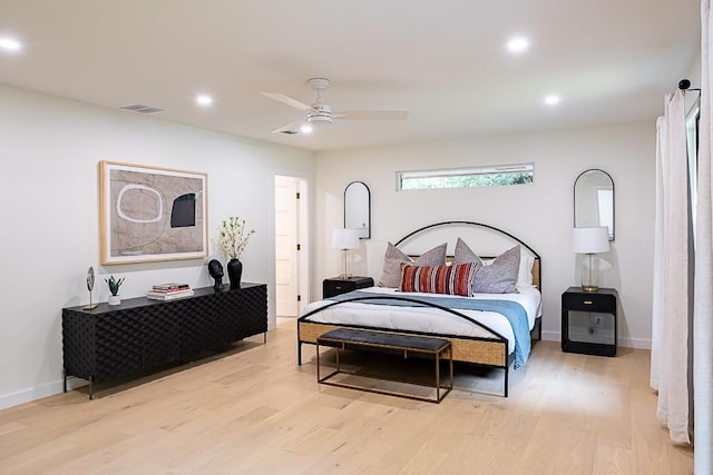 bedroom featuring light hardwood / wood-style flooring and ceiling fan