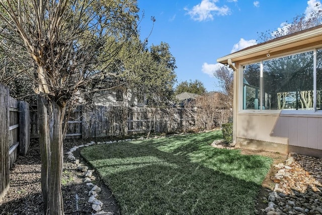 view of yard featuring a sunroom