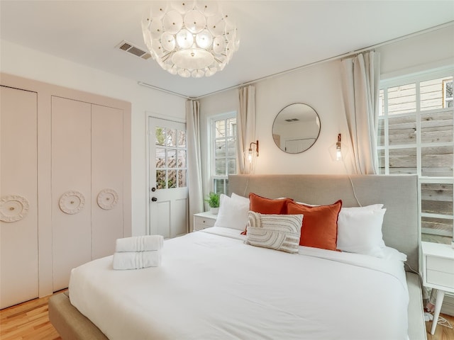 bedroom with light wood-type flooring