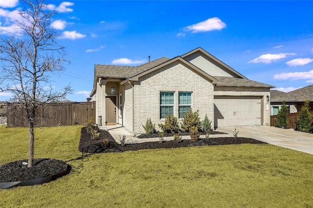 ranch-style home featuring a garage and a front lawn