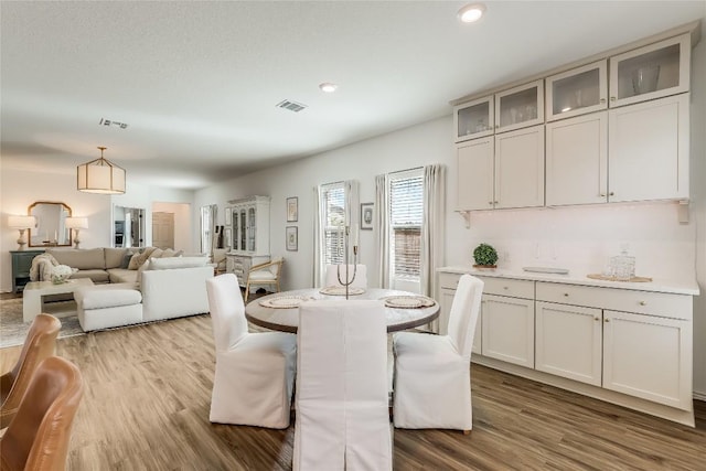 dining area featuring hardwood / wood-style floors