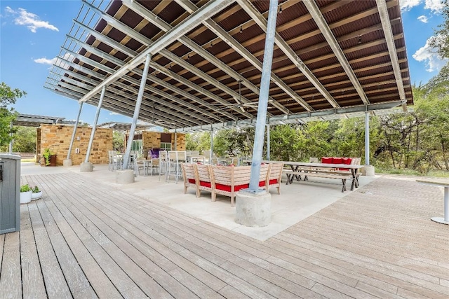 wooden deck featuring outdoor lounge area