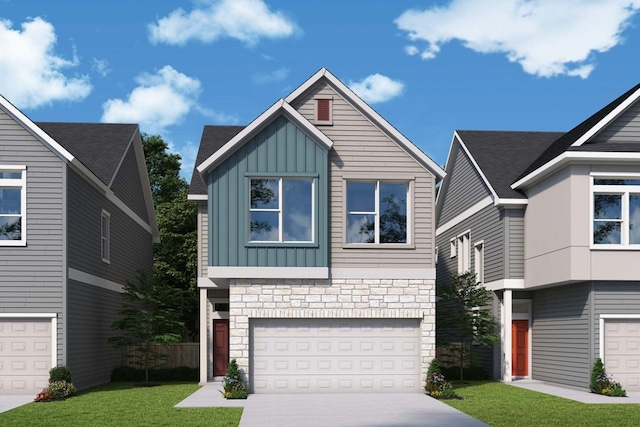 view of front of property featuring a garage and a front lawn