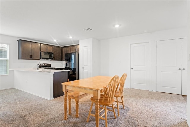 view of carpeted dining room